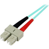 StarTech.com 2m 10 Gb Aqua Multimode 50/125 Duplex LSZH Fiber Patch Cable LC - SC